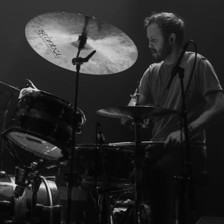 Andrew Tolman performing on drums